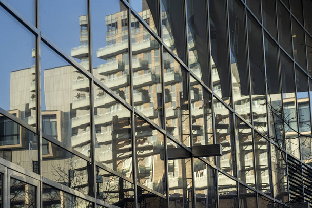 Milan, Lombardy, Italy: modern buildings in Alvar Aalto square. Reflections - 写真・画像