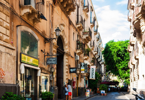 Catania, Sicily, Ital : view of the street in the historical part of the city, old buildings in the Barocoo style, traditional architecture - 写真・画像