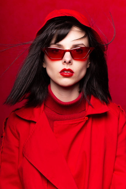 girl in red, scattered hair, red glasses - Photo, Image