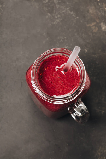 Berry smoothie on rustic background, top view - Foto, imagen