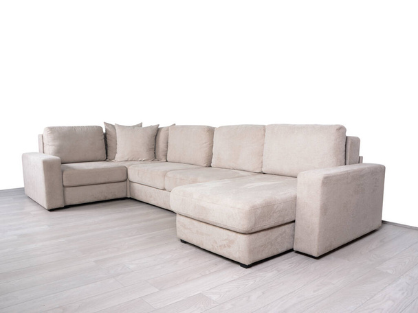 Gray large furniture on laminate flooring - Photo, Image