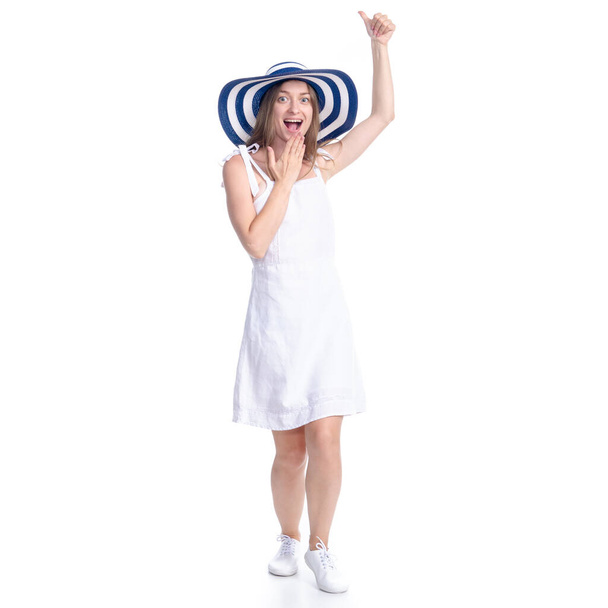 Woman in dress and summer hat smiling happiness standing pointing showing - Fotoğraf, Görsel