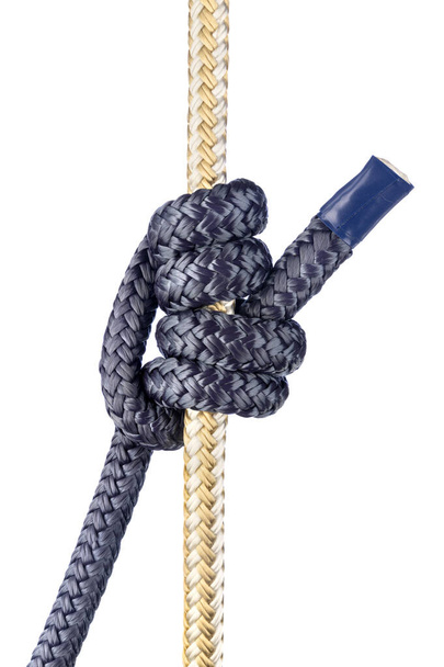 The double fishermans knot is generally used for thin, stiff or slippery lines. Aside from its nautical applications, it is often used in climbing, arboriculture, and search and rescue - Fotoğraf, Görsel