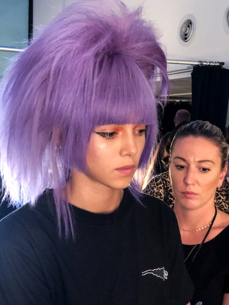 NEW YORK, NEW YORK - SEPTEMBER 06: A model getting ready backstage for the Jeremy Scott runway show during NYFW at Spring Studios on September 06, 2019 in NYC - Fotoğraf, Görsel