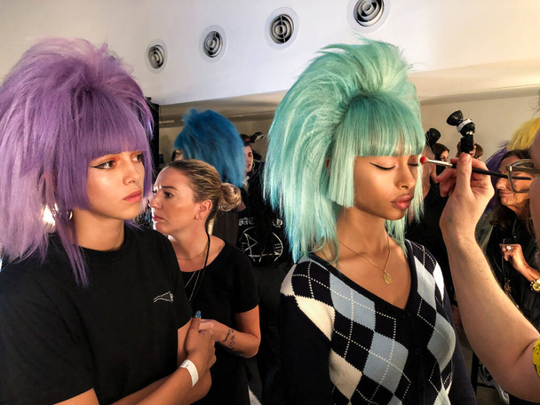 NEW YORK, NEW YORK - SEPTEMBER 06: A model getting ready backstage for the Jeremy Scott runway show during NYFW at Spring Studios on September 06, 2019 in NYC - Photo, Image