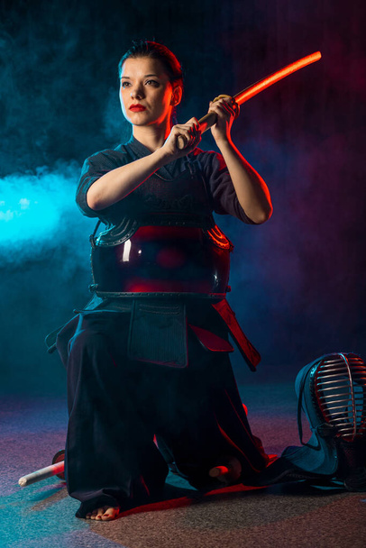confident female kendo fighter isolated - Foto, Imagen