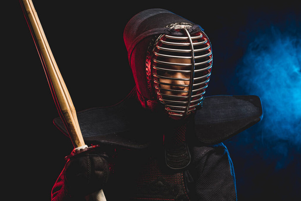 young kendo fighter with shinai. Tradition kendo armor - Fotó, kép