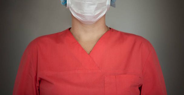 Women doctor wearing protective mask to fight coronavirus covid-2019. - Photo, image