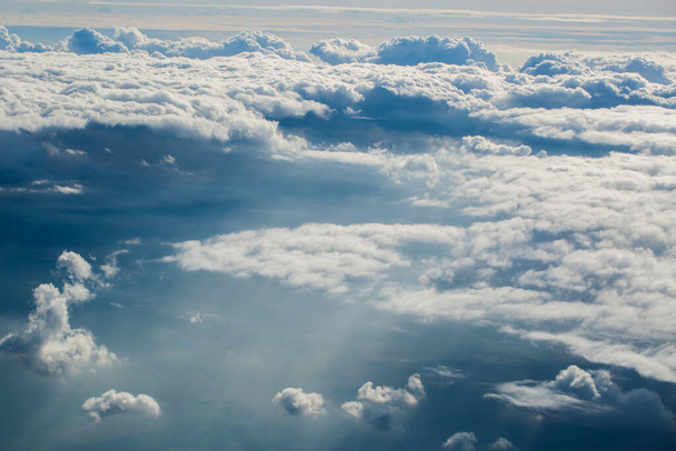 View of the clouds from the plane window. - Photo, Image