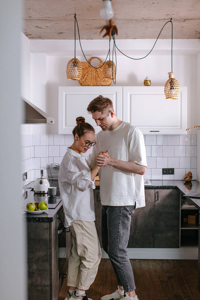 married couple in love, dance in kitchen - Fotoğraf, Görsel