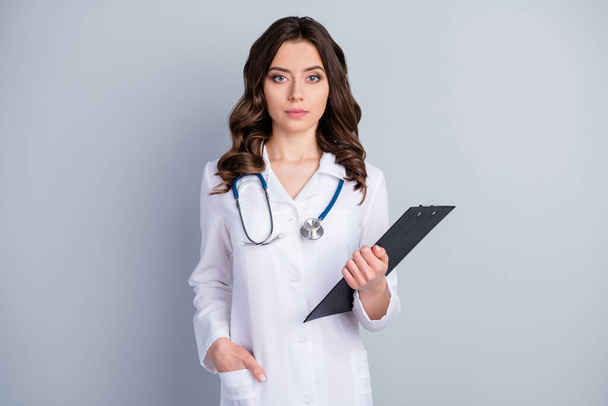 Photo of beautiful professional doc practitioner intern lady hold patient papers medical prescriptions wear white lab coat stethoscope isolated grey color background - Fotoğraf, Görsel