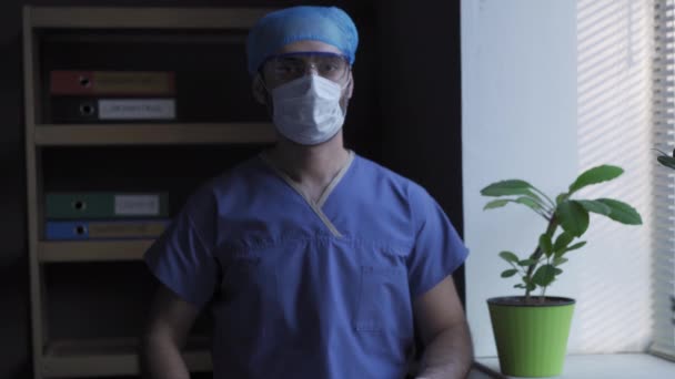 Male doctor showing warning sign - Video, Çekim