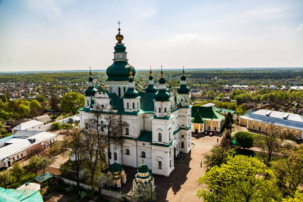 Landscape view of Chernihiv on a sunny spring day from a height against the Holy Trinity Cathedral - Photo, Image
