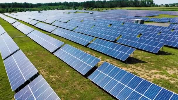 Aerial solar photovoltaic. Aerial view of power farm producing clean energy - Filmati, video