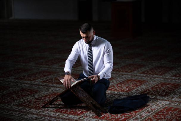 Businessman Muslim Making Traditional Prayer to God Allah in the Mosque - Фото, зображення