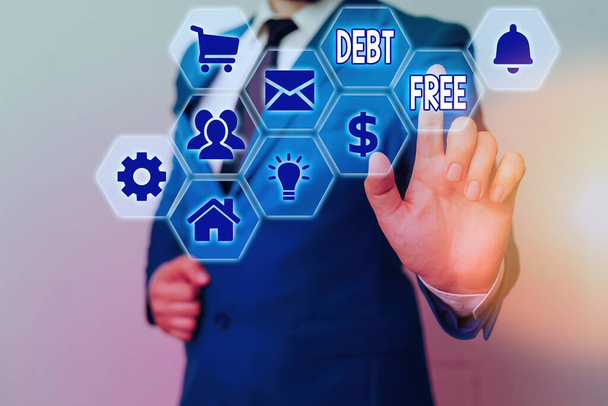Conceptual hand writing showing Debt Free. Business photo showcasing free from owning any money to any individual or a company. - Photo, Image