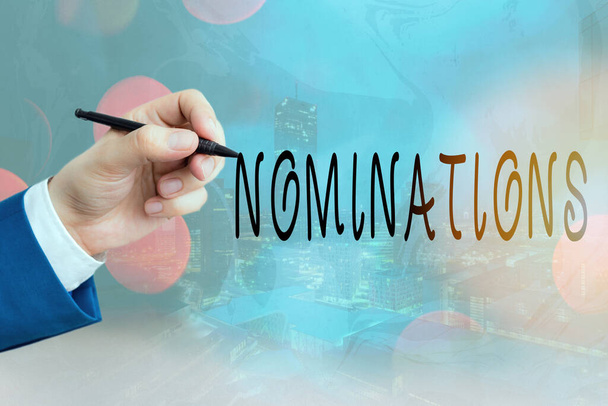 Conceptual hand writing showing Nominations. Business photo text the act of officially suggesting someone for a job or position. - Photo, Image