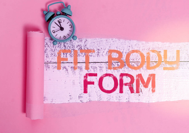 Notatka z napisem "Fit Body Form". Prezentacja zdjęć biznesowych odnosi się do ciała, które idealnie dopasowuje kształt i kontur. - Zdjęcie, obraz