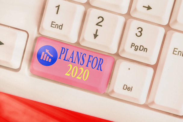 2020年の計画を示すメモを書く自分が何をしようとしているかについての意図や決定を示すビジネス写真. - 写真・画像