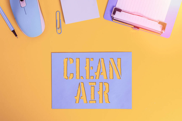 Conceptual hand writing showing Clean Air. Business photo showcasing air that has no harmful levels of dirt and chemicals in it Clipboard paper sheet mouse pencil note colored background. - Photo, Image