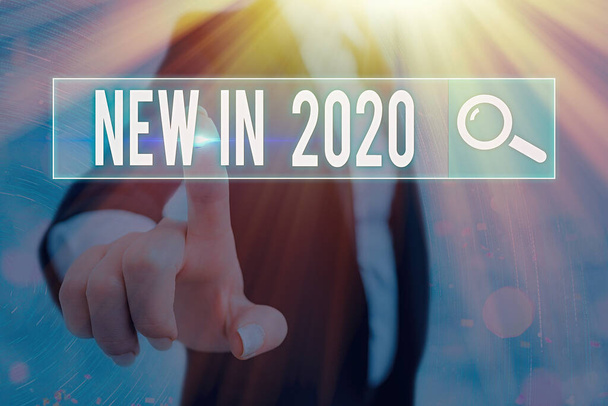 Nota di scrittura che mostra New In 2020. Business photo in mostra ciò che si aspetta o nuova creazione per l'anno 2020
. - Foto, immagini