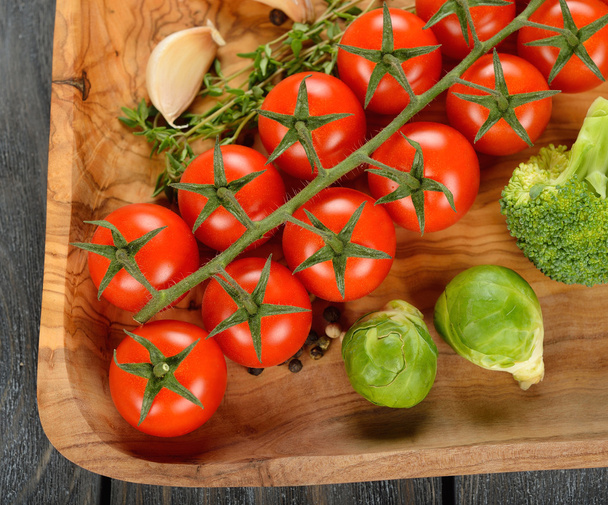 Cherry tomatoes and vegetables - Фото, изображение