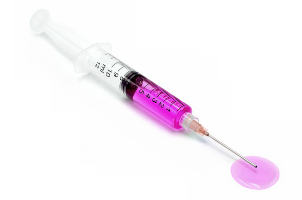 kolorowe wstrzyknięcie szczepionki na białym - Zdjęcie, obraz