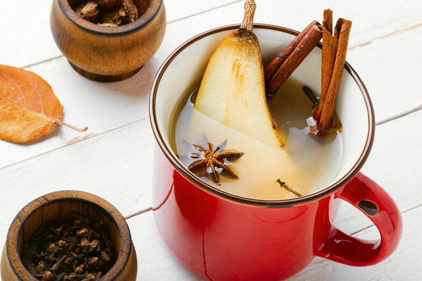 Autumn traditional popular mulled wine.Warm pear wine with spicy spices. - Photo, Image