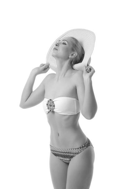 beauty female wearing bikini. Studio photo of the young girl - Foto, Imagen