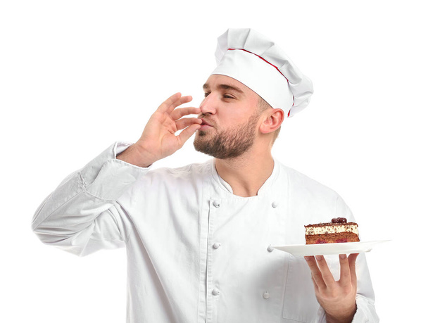 Bonito chef masculino com sobremesa no fundo branco
 - Foto, Imagem