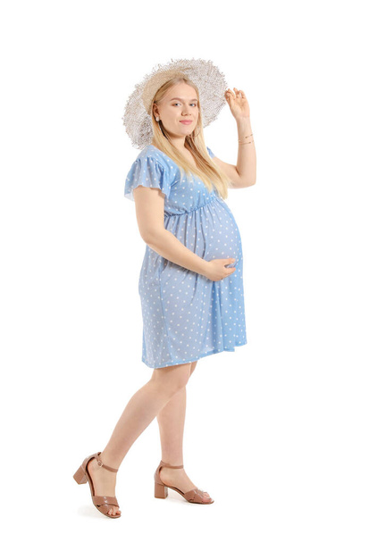 Belle femme enceinte sur fond blanc - Photo, image