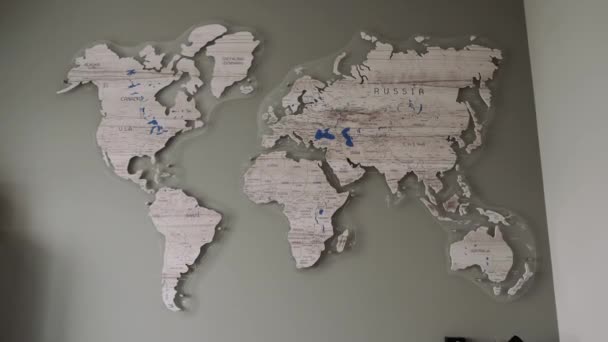 The camera slowly approaches the wall map of the world - Footage, Video