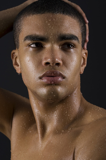 Face of man with water drops - Photo, image