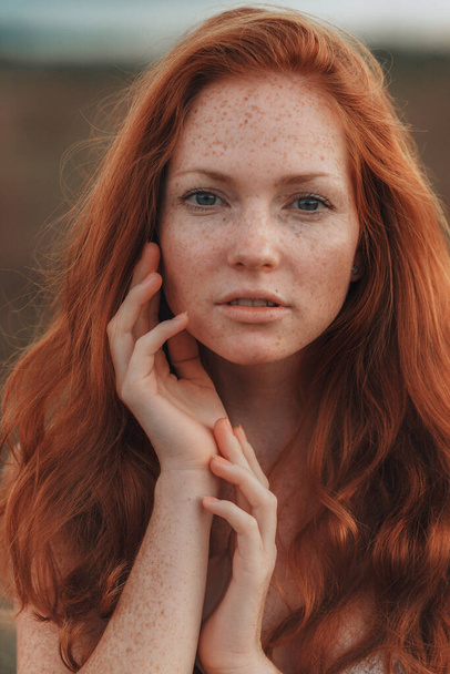 Positive natural close up portrait of young gorgeous caucasian ginger girl with freckles. Healthy lifestyle, beauty, natural concept. Melancholic beautiful portrait - Zdjęcie, obraz