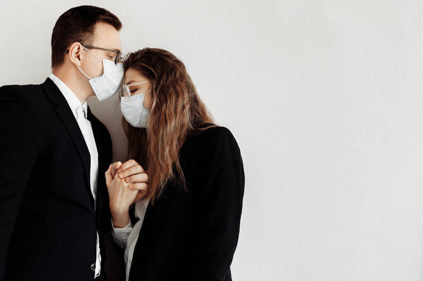 Young business people wearing face masks in studio  - Foto, immagini