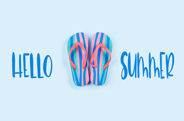Summer flip flop pair on blue. Hello summer - Foto, imagen