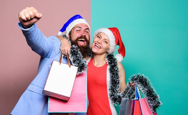 i love you. christmas shopping sales. winter holidays celebrate together. happy new year party. gift with love. time for presents. happy family couple on xmas. santa man and woman with tinsel - Фото, изображение