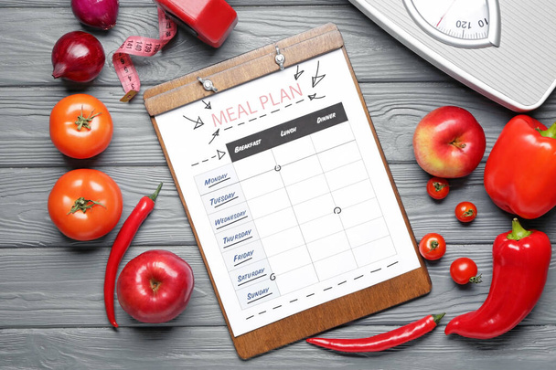 Meal plan with healthy products and scales on wooden background - Photo, Image