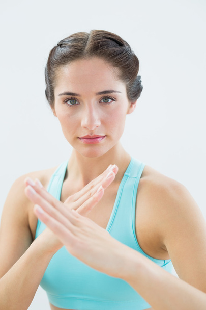 Close-up portrait of a fit woman in defending posture - Photo, Image