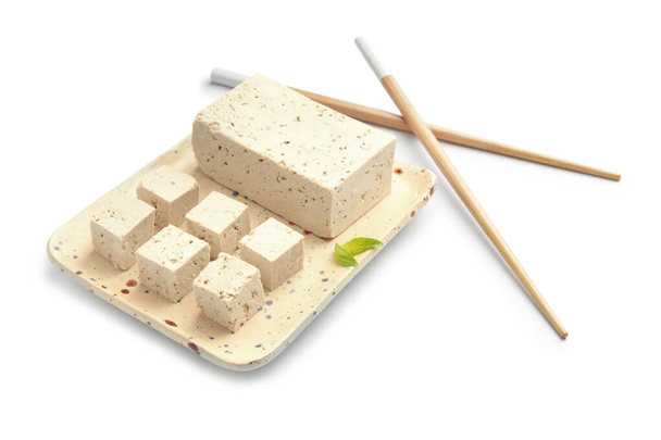 Plate with tasty tofu cheese on white background - Photo, Image