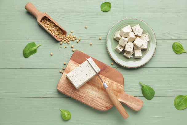 Tasty tofu cheese on color wooden background - Photo, Image