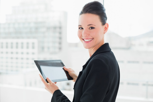 Close-up of an elegant businesswoman with tablet PC - Foto, Bild