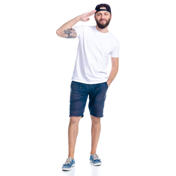 Man in shorts and cap standing happiness smiling - Photo, Image