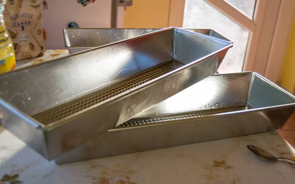 sweet bread trays on the kitchen - Foto, Imagen
