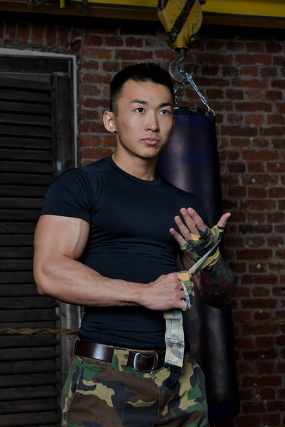 Asian fit model in boxing ring. - Photo, Image