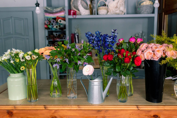 Assortment of beautiful flowers in shop. beautiful colorful flowers - Valokuva, kuva