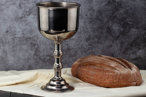 holy communion chalice with wine and bread. - Photo, Image