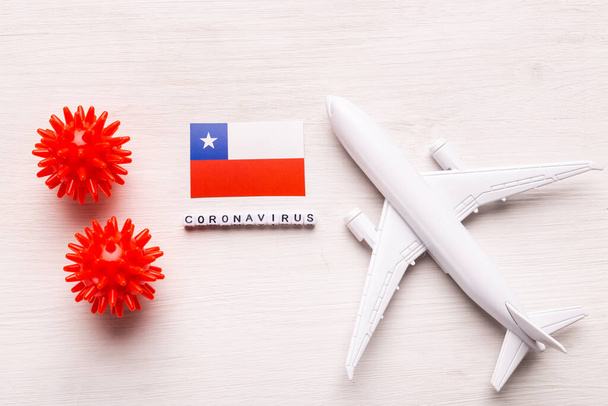 Flight ban and closed borders for tourists and travelers with coronavirus covid-19. Airplane and flag of Chile on a white background. Coronavirus pandemic. - Foto, imagen