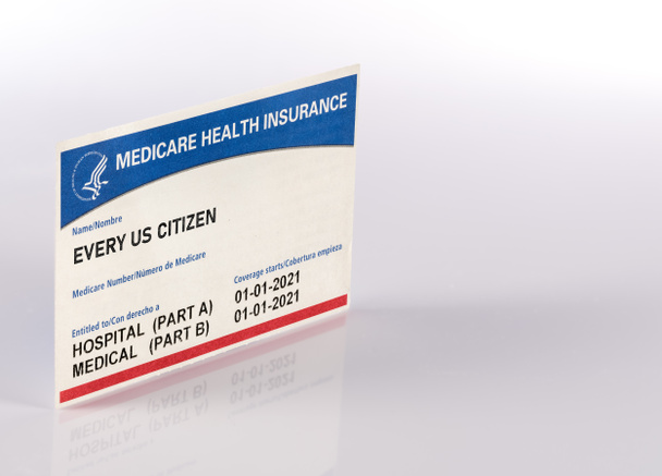USA medicare health insurance card for US Citizens isolated against white background - Photo, Image