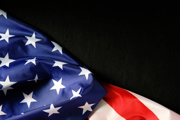 Flag of the United States of America with a place for the inscription.USA black background - Foto, Imagen